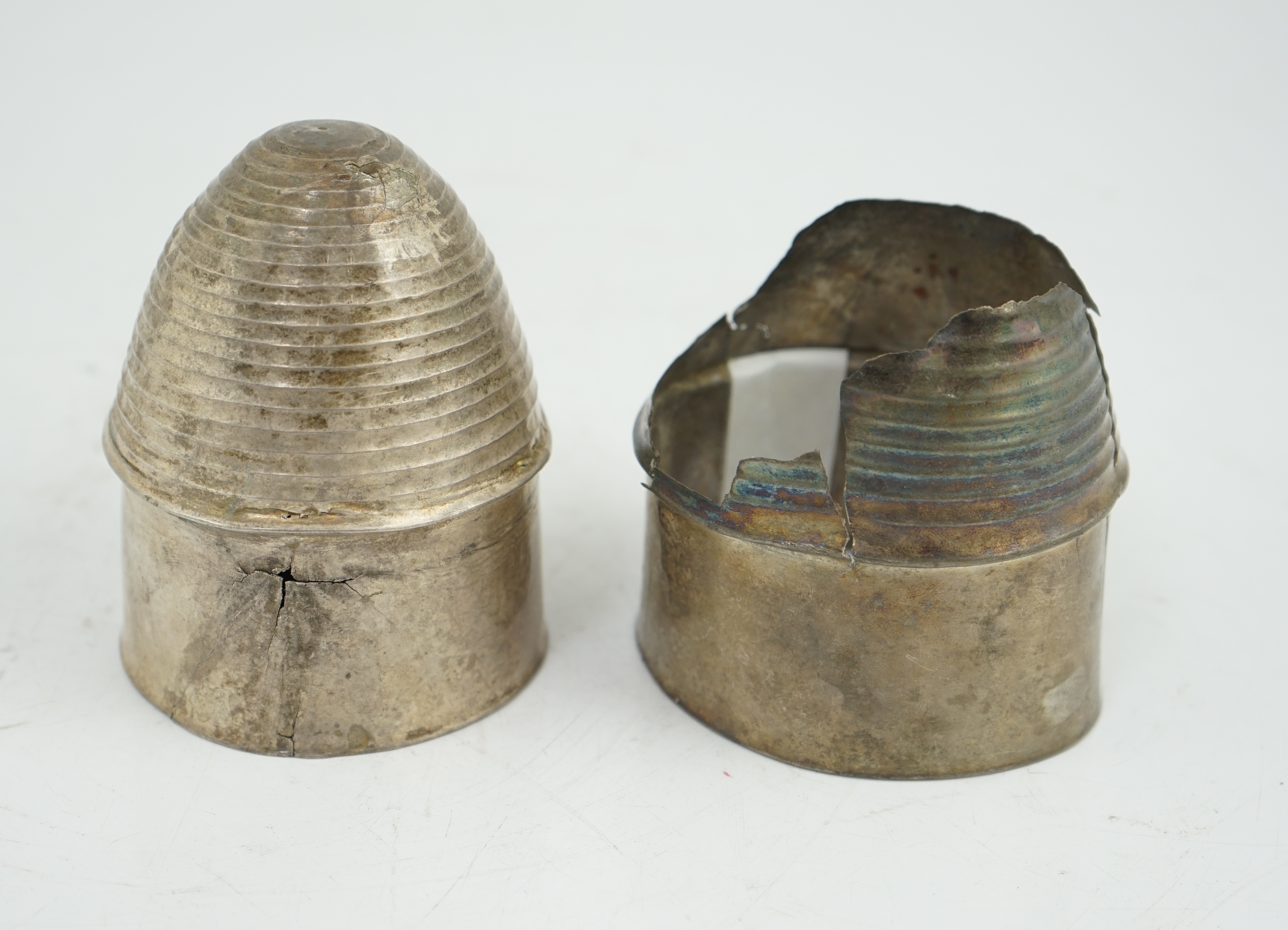 Two silver carinated cups, one fragmentary, Roman or Gandhara, c. late 1st century BC - early 1st century A.D.